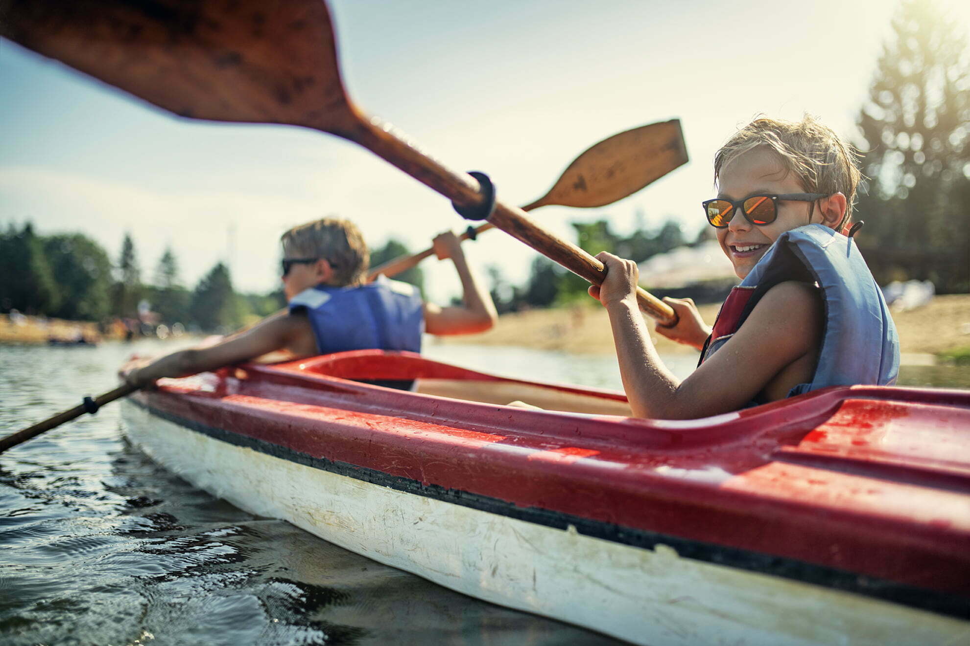 two boys in a kayak
