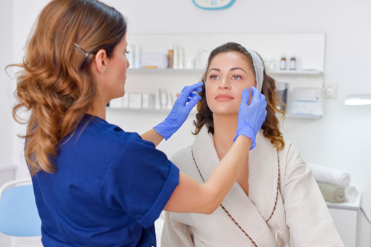 Woman during a Fort Worth facial plastic surgery consultation with a female plastic surgeon