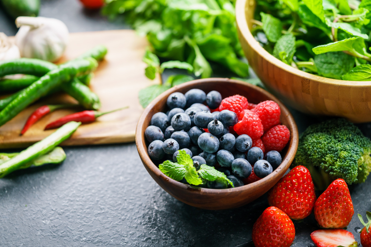 Mixed berries and leafy greens to support skin and recovery health
