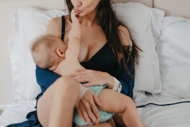 Mother breastfeeding her infant